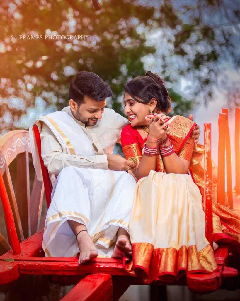 Regal red and gold bridal lehenga with matching groom sherwani